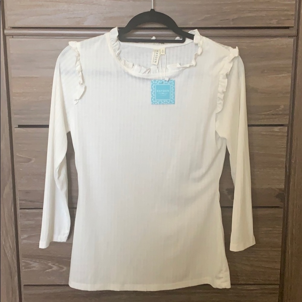 White quarter sleeve ruffle top